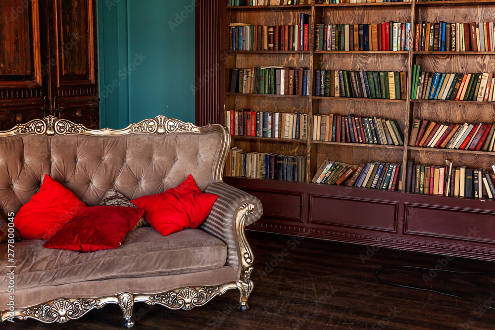 Luxury classic interior of home library. Sitting room with