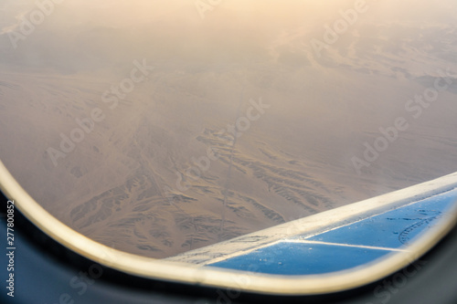 Aerial view on arabian desert and Red sea mountains from the airplane window © ihorbondarenko