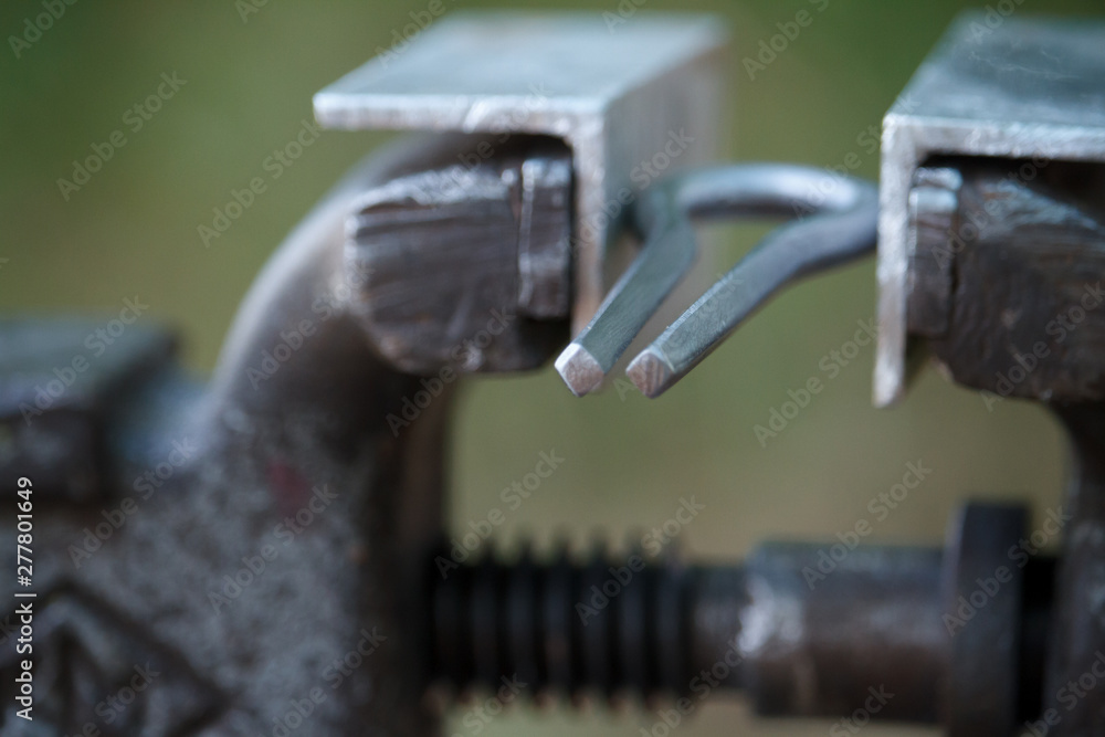 Close-up of a various parts of jaw harps, khomuses, folk musical instruments, selective focus Close-up of a various parts of jaw harps, khomuses, folk musical instruments, selective focus