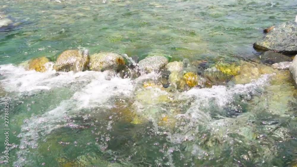 beautiful and clean river flows over rocks at Melangkap river, Sabah, Malaysia. 4K beautiful and clean river flows over rocks at Melangkap river, Sabah, Malaysia. 4K