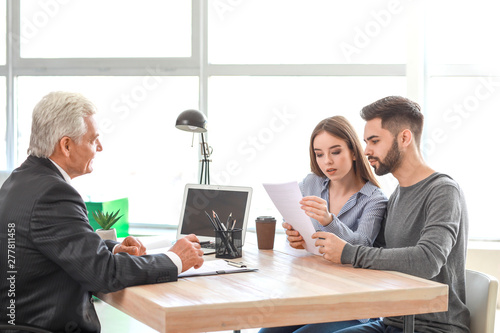 Couple meeting with notary ...