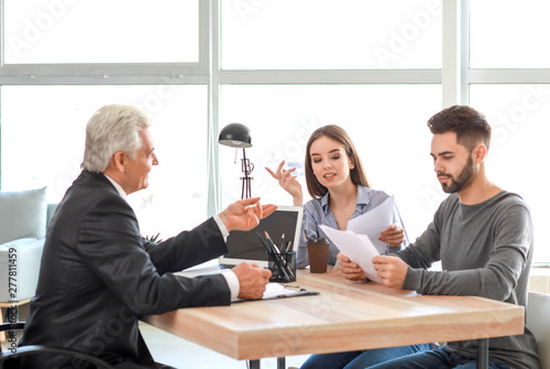 Couple meeting with notary ...
