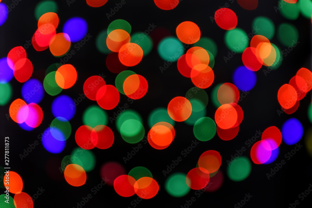 Colorful defocused lights on dark background