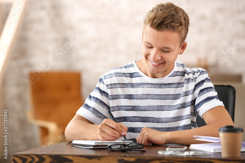 Male student preparing for ...