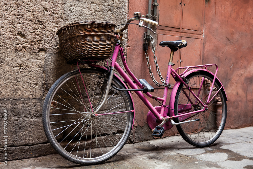 Parked bicycle at the beautiful streets of Pisa Parked bicycle at the beautiful streets of Pisa