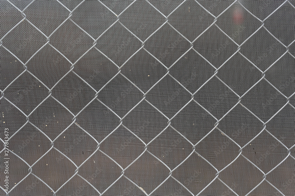 Fototapeta premium Steel wire mesh fence with mosquito wire screen.