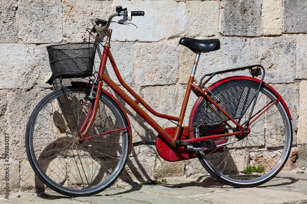 Parked bicycle at the beautiful streets of Pisa