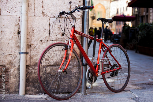 Parked bicycle at the beautiful streets of Pisa