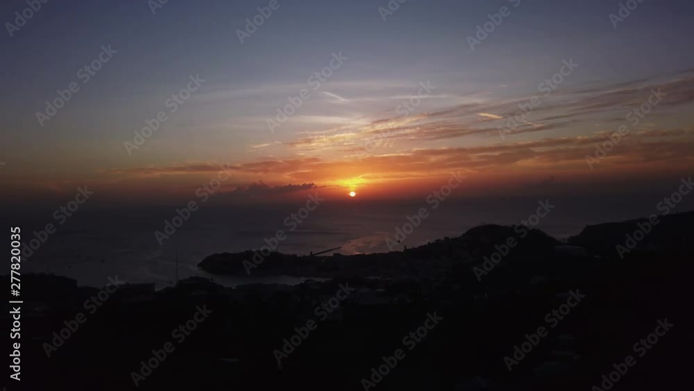 Amazing shot of a Caribbean sunset with a yacht in the foreground Amazing shot of a Caribbean sunset with a yacht in the foreground
