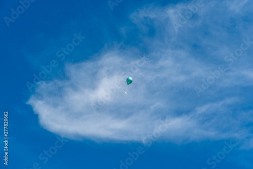 balloon with greeting card in the sky