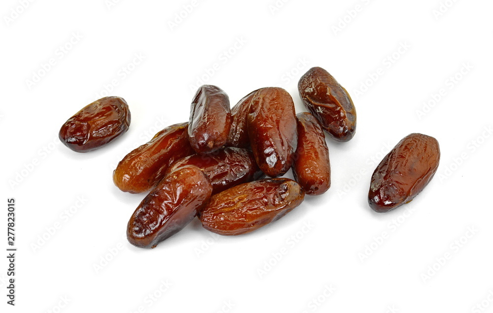 Dried dates over white background. Heap of dried dates isolated on white background. Dried dates over white background. Heap of dried dates isolated on white background.