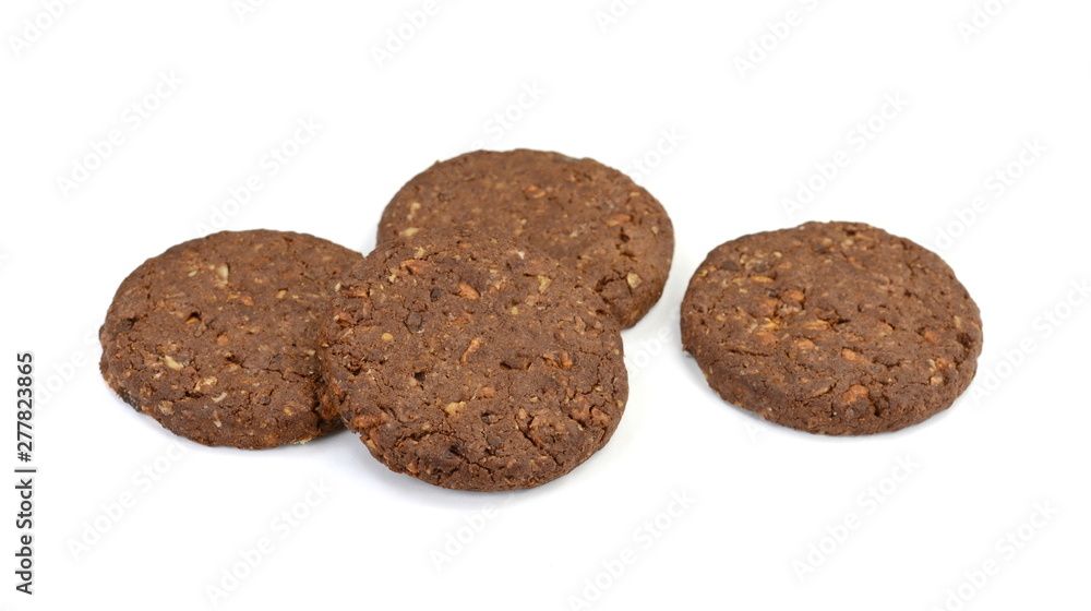 Round chocolate whole wheat biscuit, cookie with raisins isolated on white background. Chocolate Biscuits with whole-wheat (wholemeal) flour isolated on white background Round chocolate whole wheat biscuit, cookie with raisins isolated on white background. Chocolate Biscuits with whole-wheat (wholemeal) flour isolated on white background