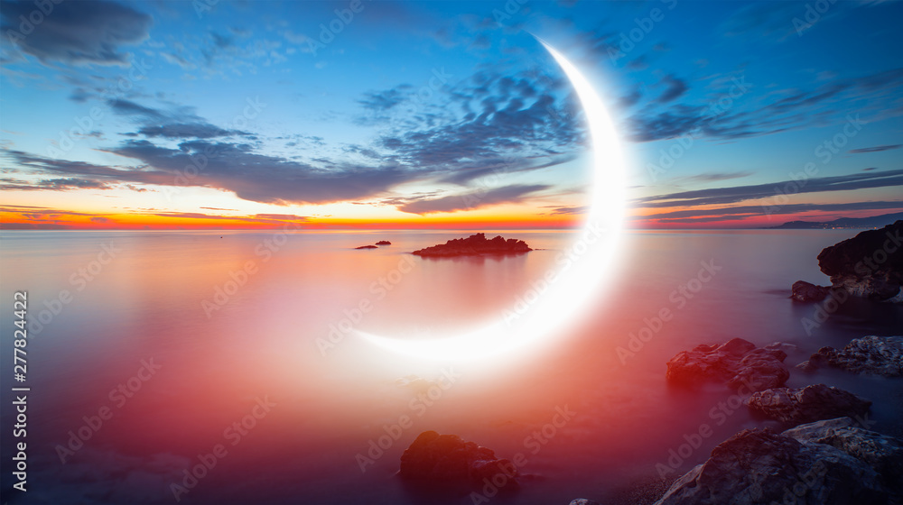 Obraz premium Night sky with crescent moon in the clouds 