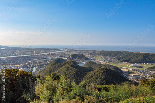 View for Tottori city from Tottori castle in Japan. cityscape, stream and sea.