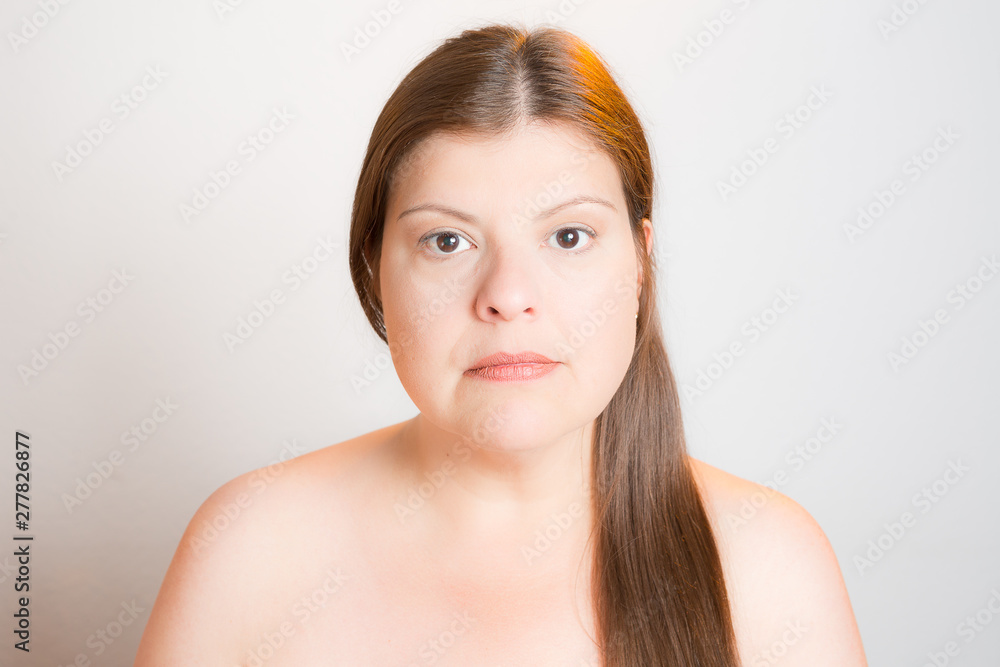 Modern lighting in studio portrait with yellow hair light to give depth and reflector below to reduce shadows. From a series of portraits that shows different setups. Modern lighting in studio portrait with yellow hair light to give depth and reflector below to reduce shadows. From a series of portraits that shows different setups.