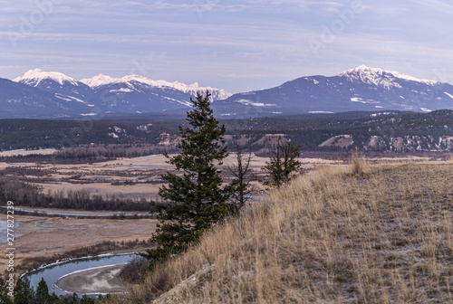 early spring morning at columbia river valleynear Radium Hot Springs with rocky mountains on the background. photo