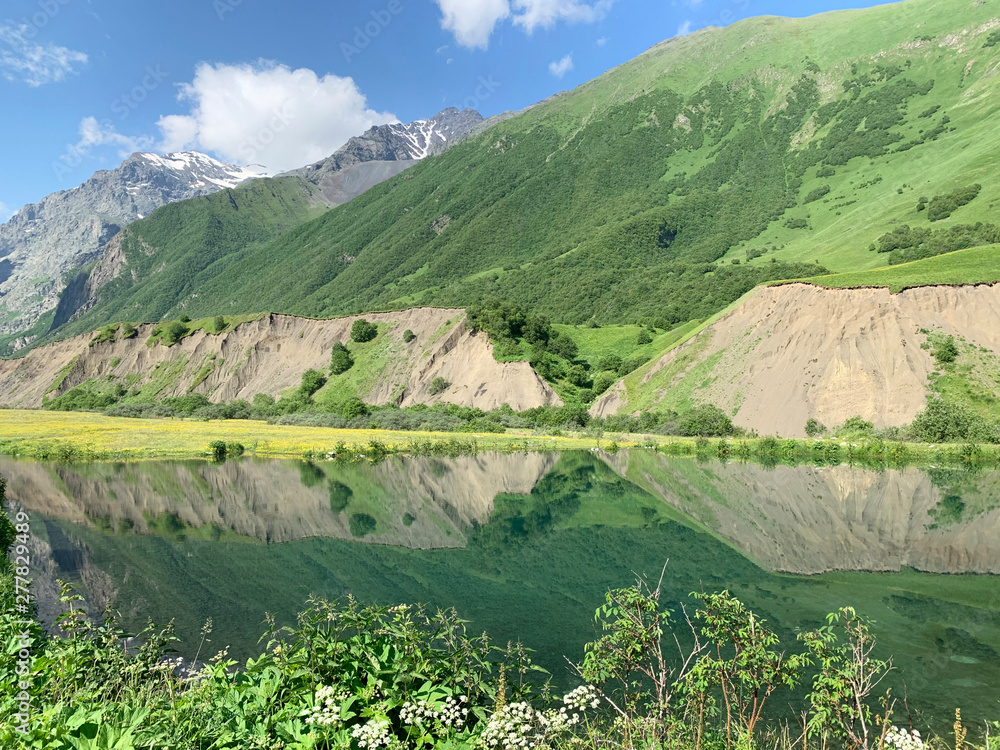 Russia, North Ossetia. Midagrabin (Midagrabinskoe) lake in the mountains in summer