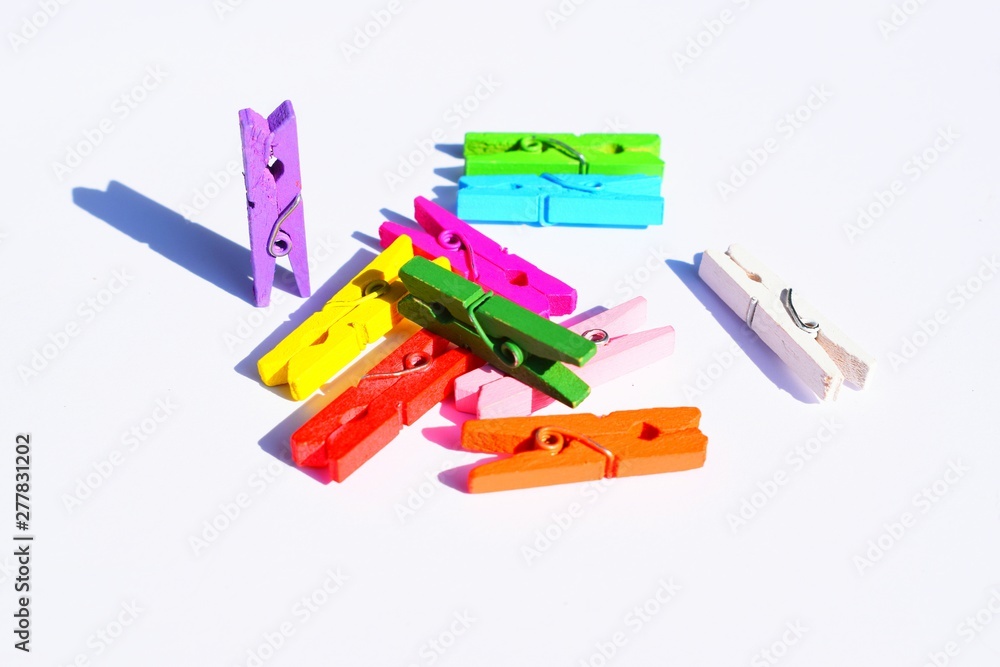 A clothespin  or clothes peg is a fastener used to hang up clothes for drying, usually on a clothes line. Clothespins often come in many different designs