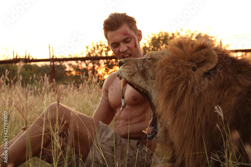 Male, sexy, sexually, model, safari, lion, man, lions, Nature, brave, Sexual, attractive, nature, zoo,  tourist, travel, tourism, exotic traveling, weekends, summer. photo