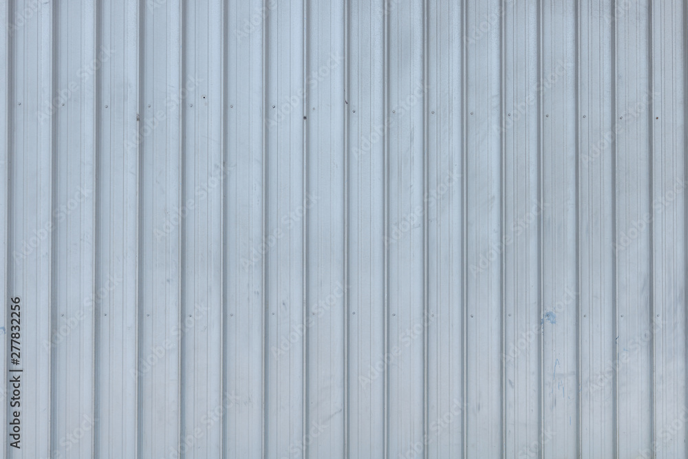 Metal plate. Siding. Seamless surface of galvanized steel. Industrial building wall Metal plate. Siding. Seamless surface of galvanized steel. Industrial building wall