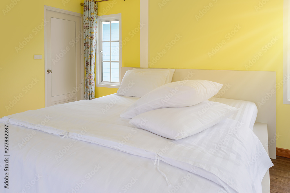 Modern yellow bedroom interior in vintage house