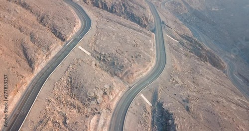 Desert mountain road on Jebel Jais mountain in the United Arab Emirates aerial view photo