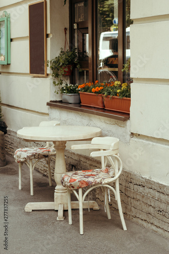 cozy vintage table of cafe in the street