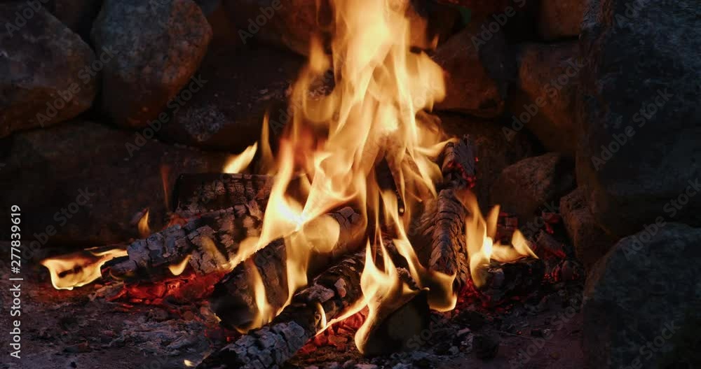 Static shot of a campfire burning. Static shot of a campfire burning.