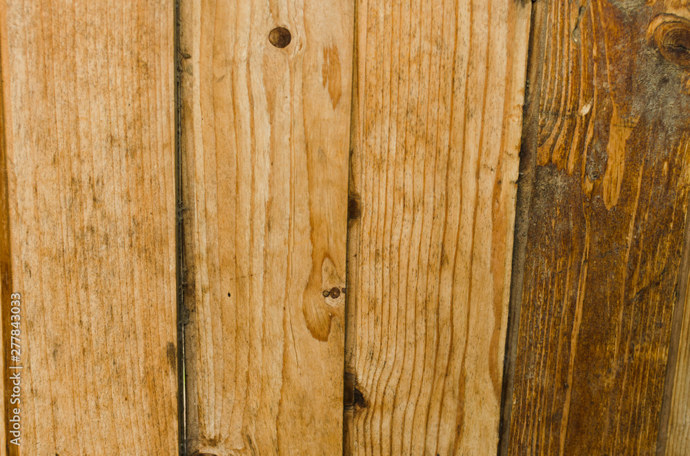 Fototapeta premium Wooden fence background closeup and boards