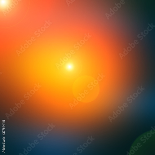 Abstract dark blue blurred background with orange spot light.
