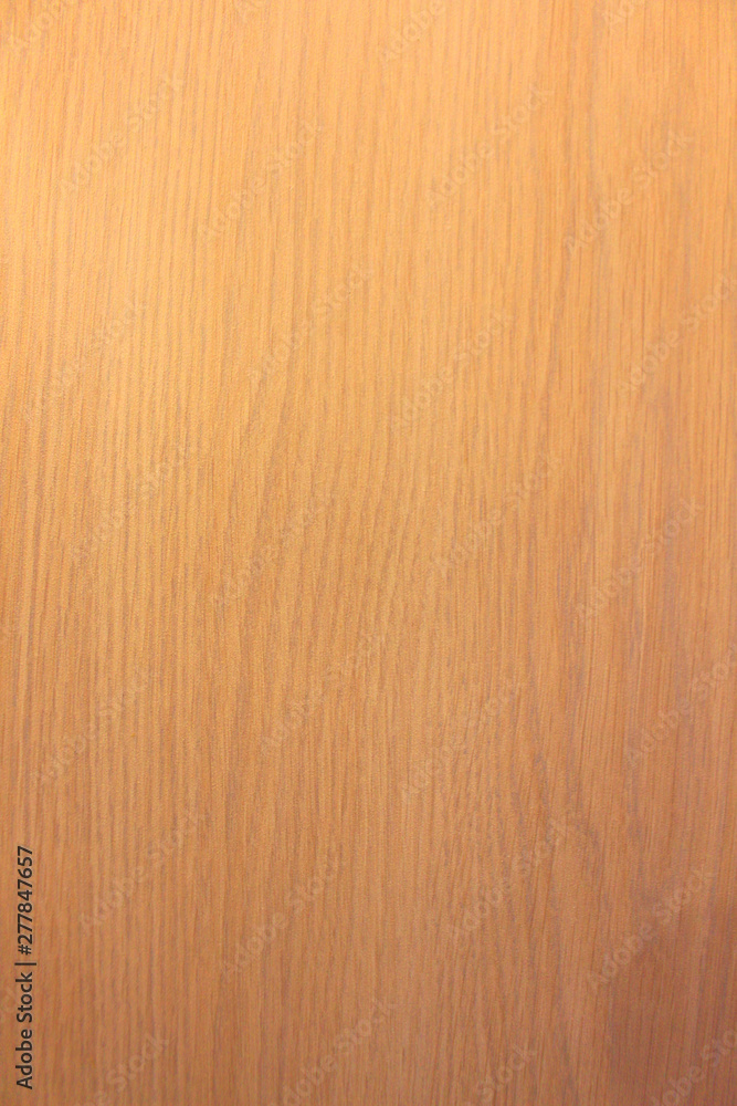 Wood texture background. Warm yellow reddish tint of wood to create a cozy mood Wood texture background. Warm yellow reddish tint of wood to create a cozy mood