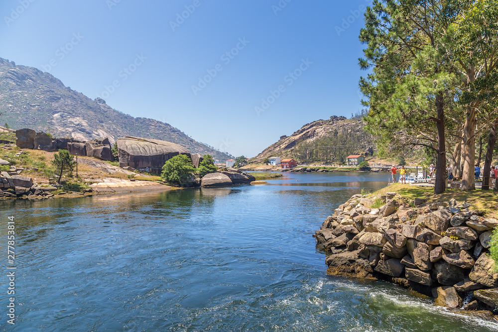 Fototapeta premium Ezaro, Spain. Picturesque landscape with a river in the mountains