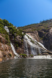 Ezaro, Spain. Scenic waterfall in the rocks