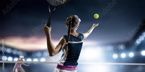 Young woman playing tennis in action. Mixed media © Sergey Nivens
