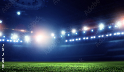 Empty night football arena in lights © Sergey Nivens