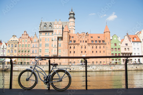 retro bicycle stand near river in old gdansk city 