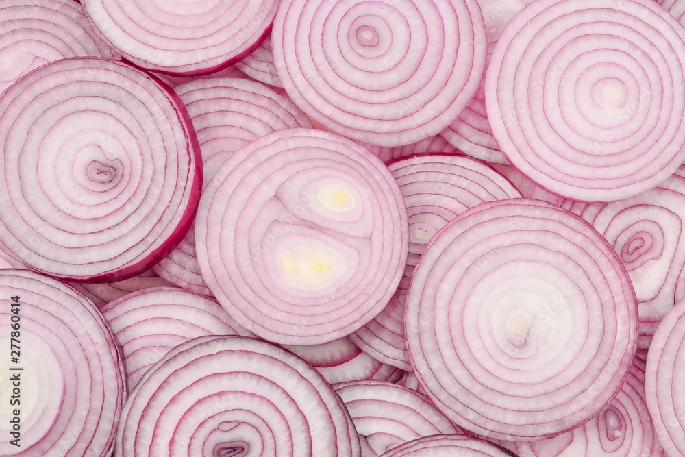 Onion slices as a background. Top view. Onion slices as a background. Top view.