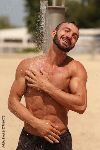 Beach, Abs , Guy. Man. Model. Shower, wash Male. Beach, Resort. Summer, Sexy, sexually, resort. Sand, Fitness. Health. Body, abs, chest, torso, fitness model, manly, brutal, shorts, Muscular, power	