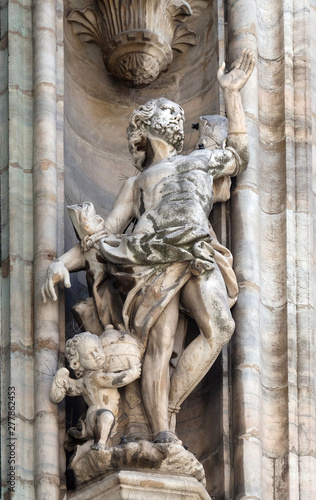 Statue of Saint on the facade of the Milan Cathedral, Duomo di Santa Maria Nascente, Milan, Lombardy, Italy