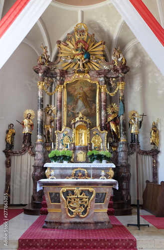 Main altar in the Saint Lawrence church in Denkendorf, Germany photo