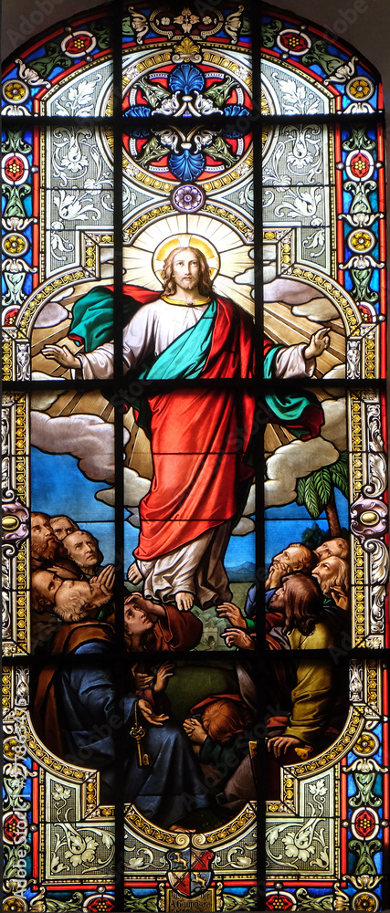 Obraz premium Ascension of Christ, stained glass window in the Saint Nicholas Evangelical church, Aalen, Germany