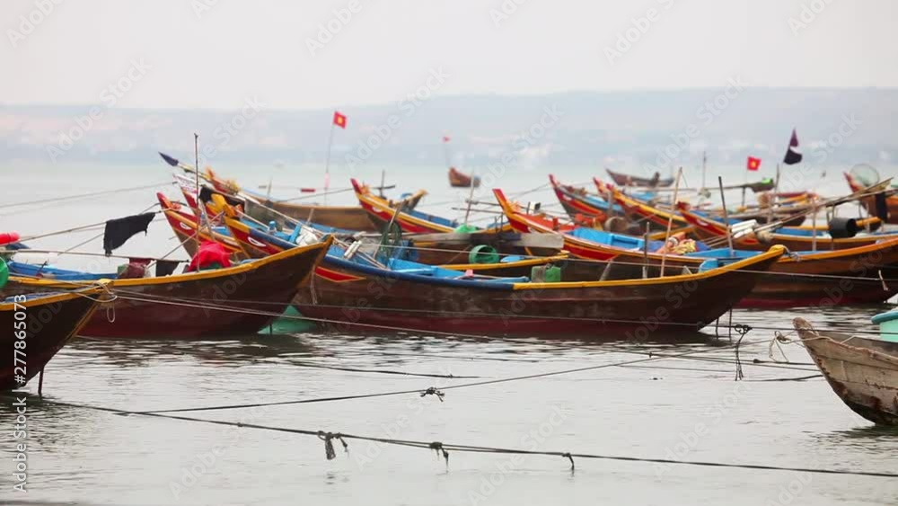 Fishing traditional boats in Vietnam. Pier fishing boats. Fisheries in Vietnam Fishing traditional boats in Vietnam. Pier fishing boats. Fisheries in Vietnam