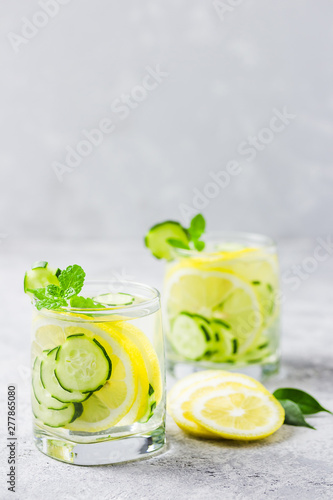 Summer refreshing drinks, lemon cucumber mint infused water. Selective focus, space for text.