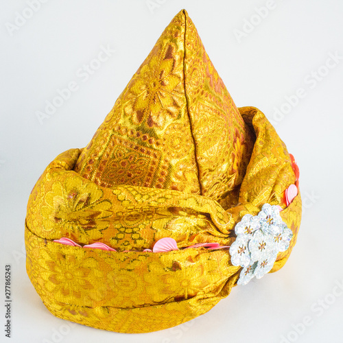 Traditional Tajik national headdress close-up on white background