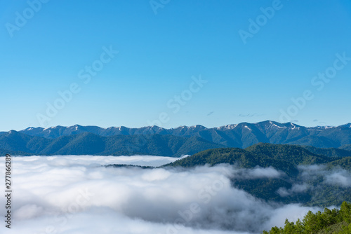 Panorama view from Unkai Terrace in summer time sunny day. Take the cable car at Tomamu Hoshino Resort  going up to see the sea of clouds. Shimukappu village  Hokkaido  Japan