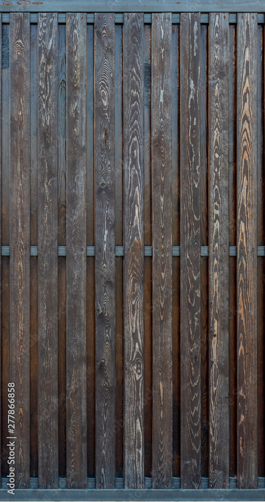 Dark wood planks of fence texture Dark wood planks of fence texture