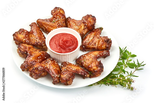 Grilled chicken wings with tomato sauce, Chinese food, close-up, isolated on white background