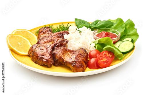 Grilled chicken Legs with rice, close-up, isolated on white background