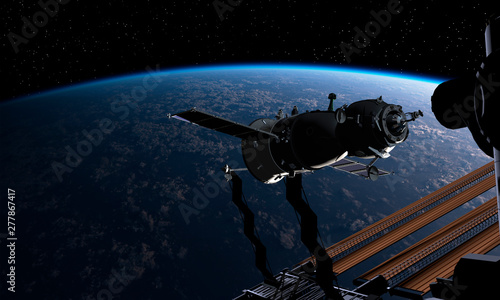 Spacecraft and spacestation at the Earth orbit