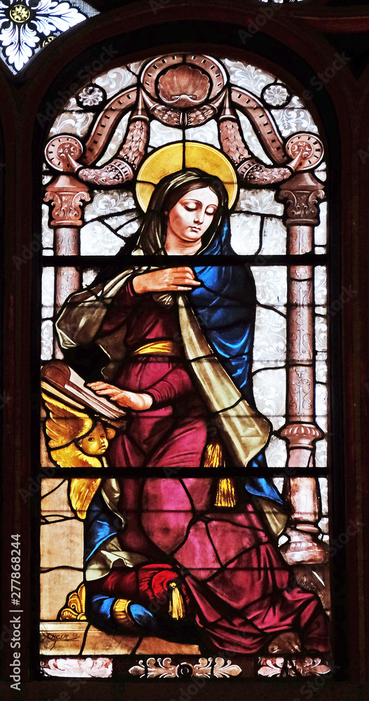 Obraz premium Annunciation of the Virgin Mary, stained glass window in Saint-Eustache church in Paris, France